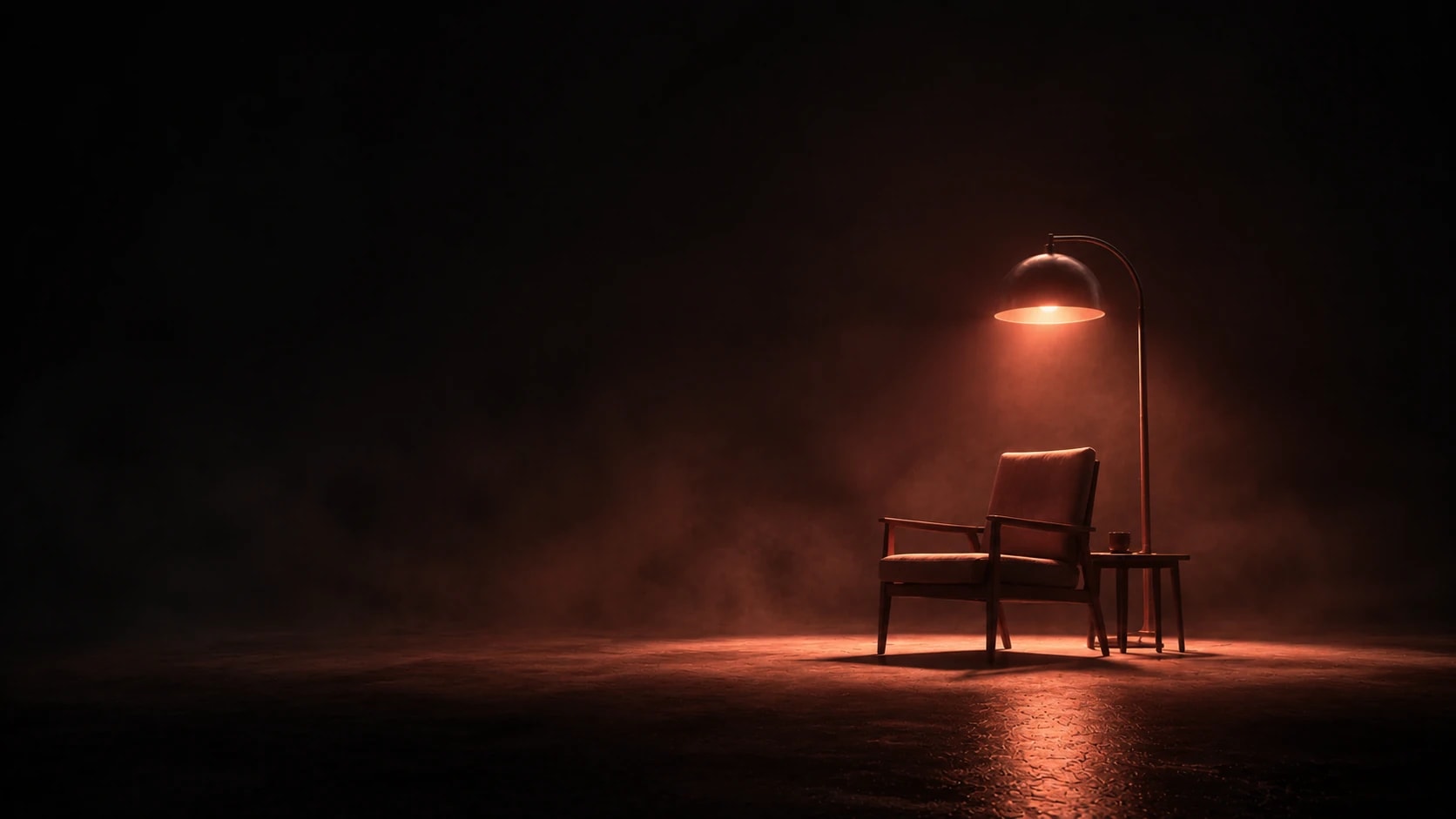A warm coral lamp glowing softly over an empty chair in a quiet, dark room